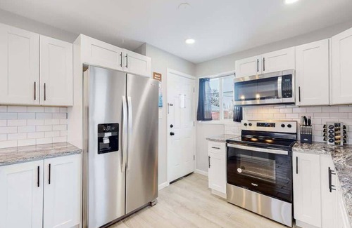 Twin Lakes House | Awesome Two King Bed Upper Unit in Denver/Red Rocks