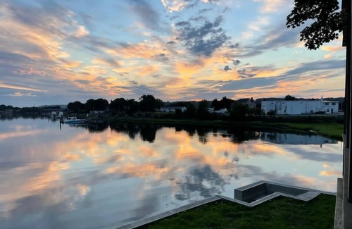 Portsmouth House | Awesome Waterfront Getaway-oversized deck overlooking the water-2 bedrooms/1bath