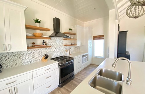 North Palmetto Point House | AZURE: Banks Rd Luxury Beachfront Home with heated pool & backup generator.