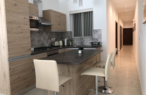 Marsalforn Apartment | Azure Cottage: Beautiful, modern 3 bedroom apartment with communal swimming pool