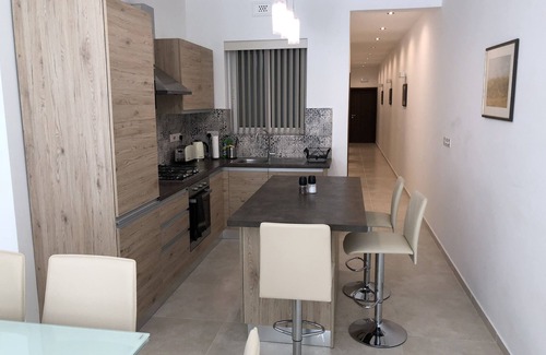 Marsalforn Apartment | Azure Cottage: Beautiful, modern 3 bedroom apartment with communal swimming pool