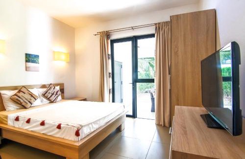 Roches Noires House | Azuri Ocean Village - Elegant 3-Bedroom Apartment with Private Garden, Beach & Pool Access in Roches Noires