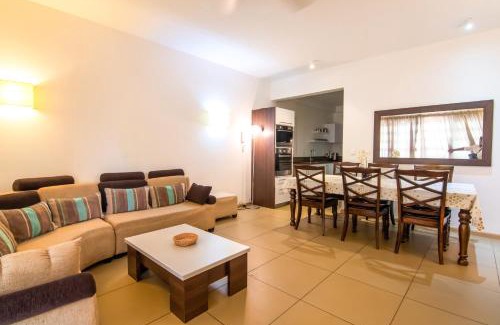 Roches Noires House | Azuri Ocean Village - Elegant 3-Bedroom Apartment with Private Garden, Beach & Pool Access in Roches Noires
