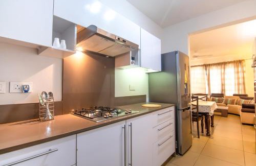 Roches Noires House | Azuri Ocean Village - Elegant 3-Bedroom Apartment with Private Garden, Beach & Pool Access in Roches Noires