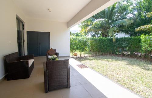 Roches Noires House | Azuri Ocean Village - Elegant 3-Bedroom Apartment with Private Garden, Beach & Pool Access in Roches Noires