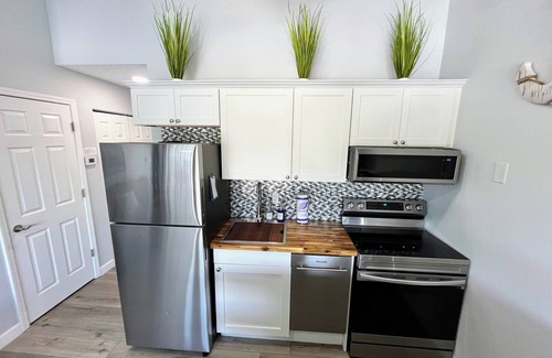 Osage Beach Condo | B Lakefront! Remolded Boat Slip Ramp, Patio Views, Sleeps 4, Pool, Kitchen WI-FI