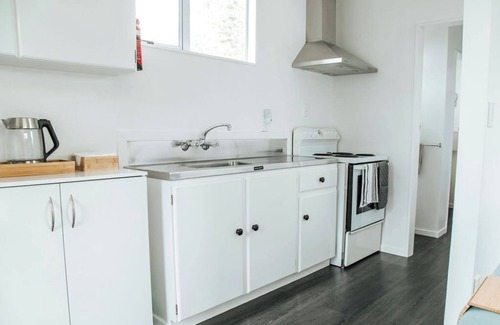 Lake Ferry Cottage | Bach 2 - Loburn Bach Accommodation, in the Lake Ferry Village