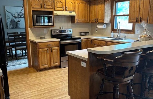 Wichita House | Backyard bliss/firepit/spacious/cozy/centrally located