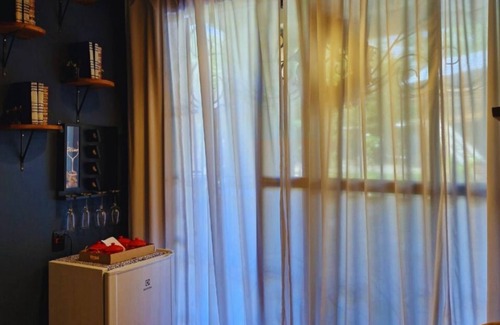 Bairro das Laranjeiras Apartment | Backyard Loft