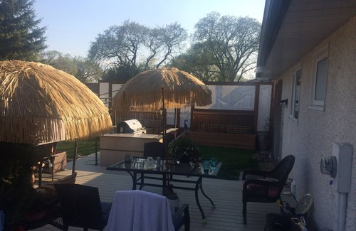 St. Vital House | Backyard oasis awaits. Enjoy your stay.