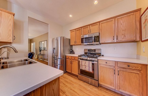 San Tan Valley House | Backyard oasis with private solar heated pool, hot tub and tons of amenities!