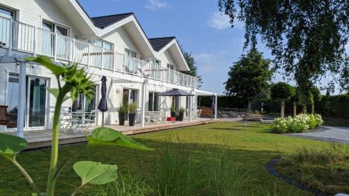 Oldenburg in Holstein House | BADEBUDE 3 Ferienhaus im Hampton Style
