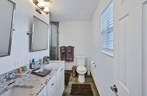 Coral Ridge Isles House | Bahama Breeze Heated pool sleeps 10 Pet Friendly