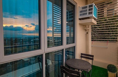 Iloilo Apartment | Balcony Bliss: Executive Comfort in Iloilo City