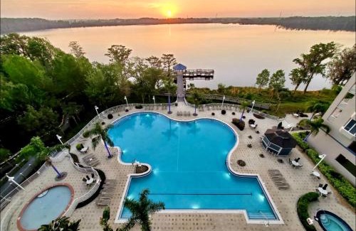 Florida Central Atlantic Coast Apartment | Balcony King Suite - Lake & Pool view