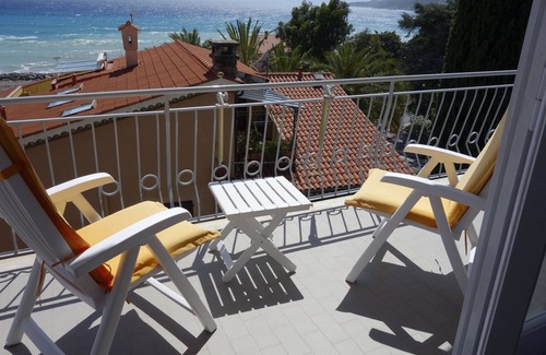 Ospedaletti Apartment | Balcony of the Moro, with vistamare. Close to beach, bars and shops. 5 positiletto.
