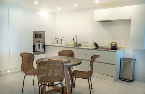 South Beach Apartment | Balcony on the Sand - Oceanfront Apartment for 4 with Resort Amenities