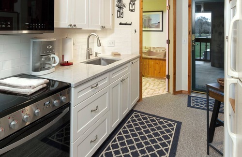 Cedar Condo | Balcony with Lake Michigan and golf view