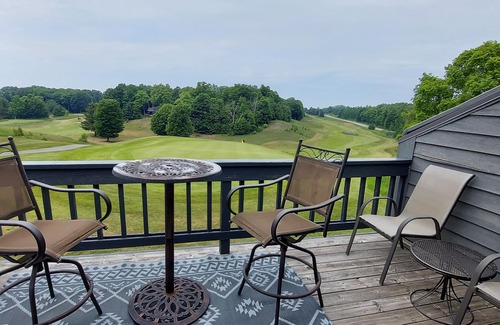Cedar Condo | Balcony with Lake Michigan and golf view