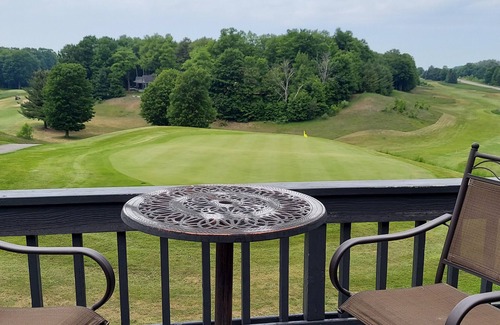 Cedar Condo | Balcony with Lake Michigan and golf view