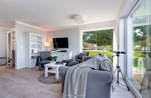 Olpenitz Apartment | Baltic Sea vacation apartment "Schleiperle" - with water view, sauna and two terraces