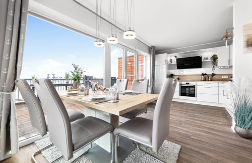 Olpenitz Apartment | Baltic Sea vacation apartment "HafenLounge" directly on the water with wellness bath & dream view