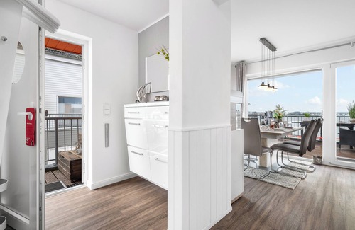 Olpenitz Apartment | Baltic Sea vacation apartment "HafenLounge" directly on the water with wellness bath & dream view