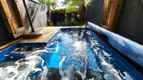Colombo House | Bangalô das Lagartixas ,casa stúdio com piscina aquecida privativa a 20 minutos do Centro de Curitiba