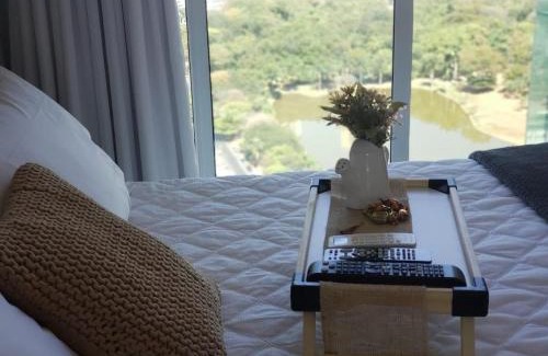 Setor Bueno Apartment | Banho de Lua - Jacuzzi com vista p/Pq. Vaca Brava