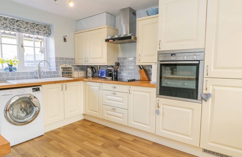 Scawton Cottage | BARN COTTAGE, pet friendly, with open fire in Kirkbymoorside