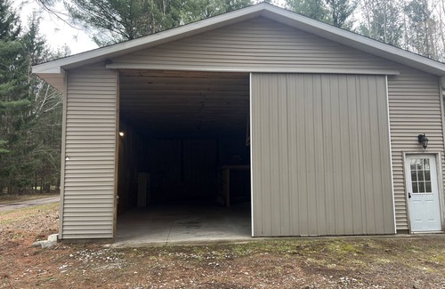Linwood House | Barn House with Inside Boat Parking