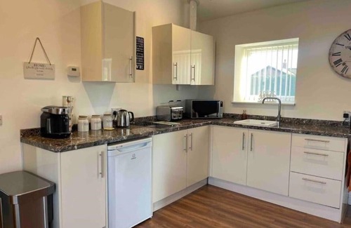 Roydon House | Barn in quiet location yet close to local amenities. Hot tub and games room.