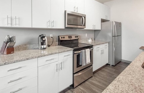 University District Apartment | Barsala l Designer 4BD Stay with Downtown Access