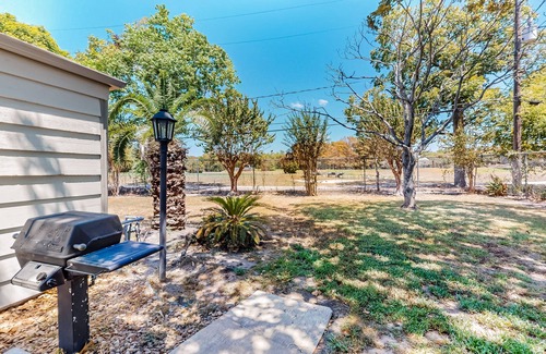 La Porte House | Bay Harbor Beauty | House in La Porte with yard and fireplace - close to beaches