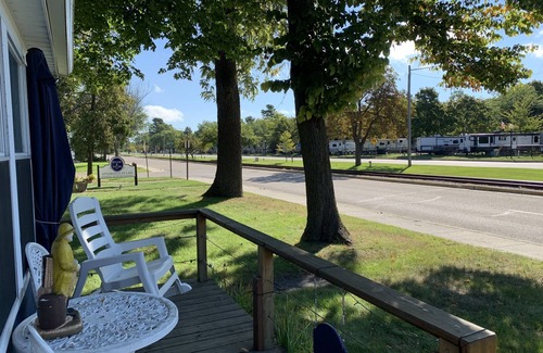 Tawas City House | Bay House Location is perfect for a stroll down Newman Street across from Public Lake Huron Beach!