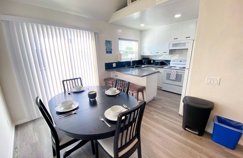 Crown Point House | Bay View Condo 1/2 block to Beach Park-Spa and Private Patio-Dog Friendly