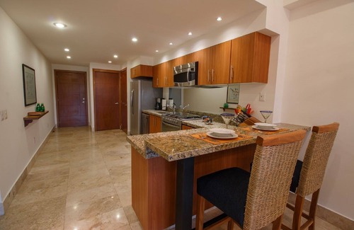 Emiliano Zapata Condo | Bay View condo - steps to Beach, Malecon, Shops and Restaurants