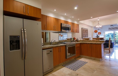 Emiliano Zapata Condo | Bay View condo - steps to Beach, Malecon, Shops and Restaurants