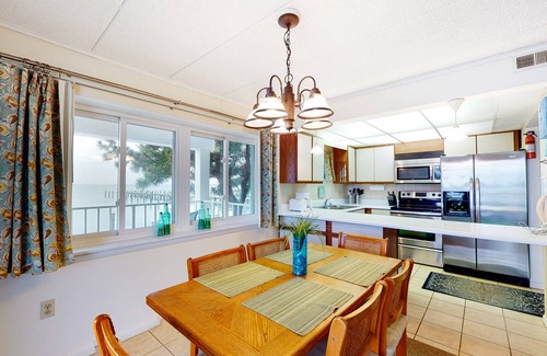 Midtown Ocean City Condo | Bayfront Condo with Great Views, Wrap-Around Deck, WiFi, W/D & Shared Pool