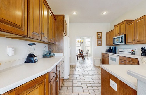 Heron Harbour Isle House | Bayfront home with WiFi, fireplace, & pool