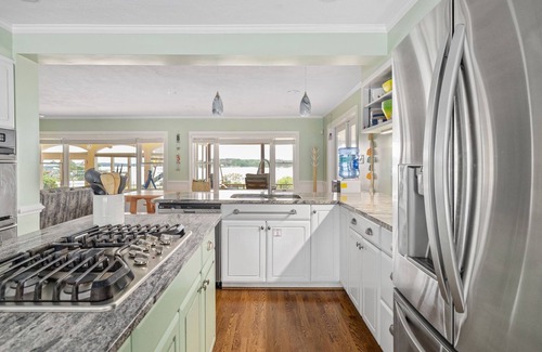 Reedville House | Bayfront Oasis with Heated Pool, Hot Tub & Playground! Family & Pet friendly!