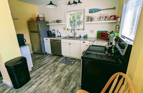 Ludington Cottage | Bayou Bungalow - On Hamlin Lake, waterfront, dock, firepit