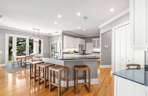 Ballast Point House | Bayshore Breeze! Private gated waterfront home in south Tampa.