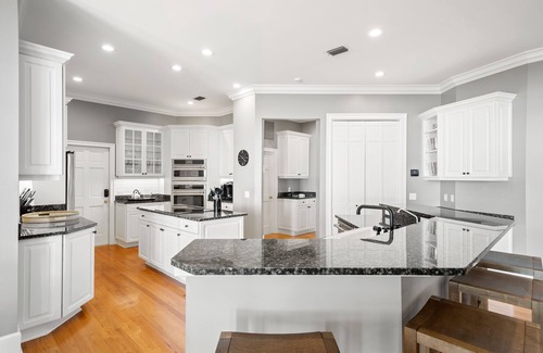 Ballast Point House | Bayshore Breeze! Private gated waterfront home in south Tampa.