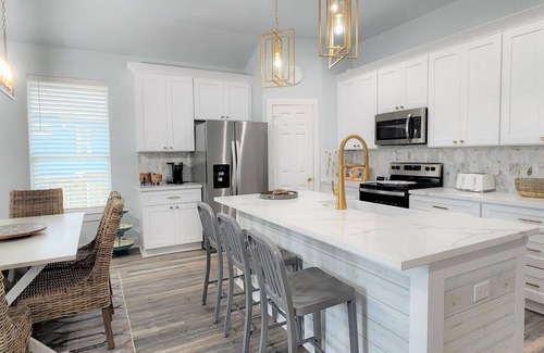 Pointe San Luis House | Bayside home close to the pool!