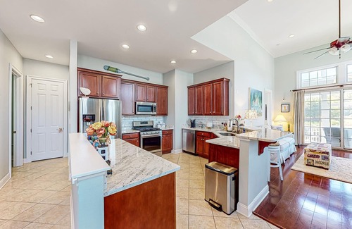 The Commons House | Bayside Resort townhome with nautical-theme, resort amenities, & water views