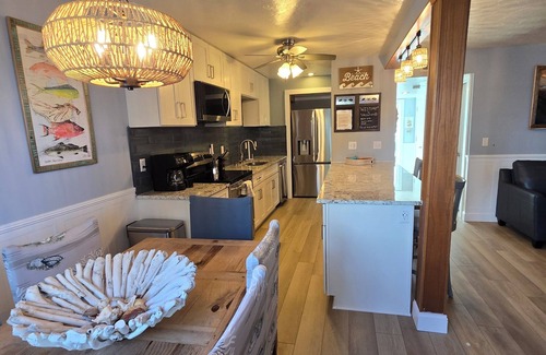 Whitney Beach House | Bayside Retreat on Palma Sola Bay.Dock nout your front door. 2 miles to beach.