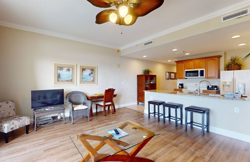 Upper Grand Lagoon Condo | Bayview condo with pool, hot tub, and private balcony