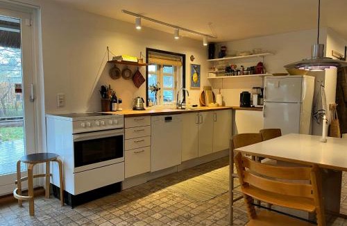 Nykobing Sjaelland House | Be Surrounded By Trees In A Thatched Cottage