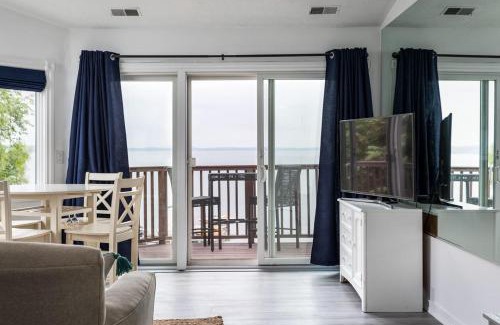 Traverse City House | Beach 321 with Vaulted Ceilings Pool Hot Tub and Stunning Views from Private Deck